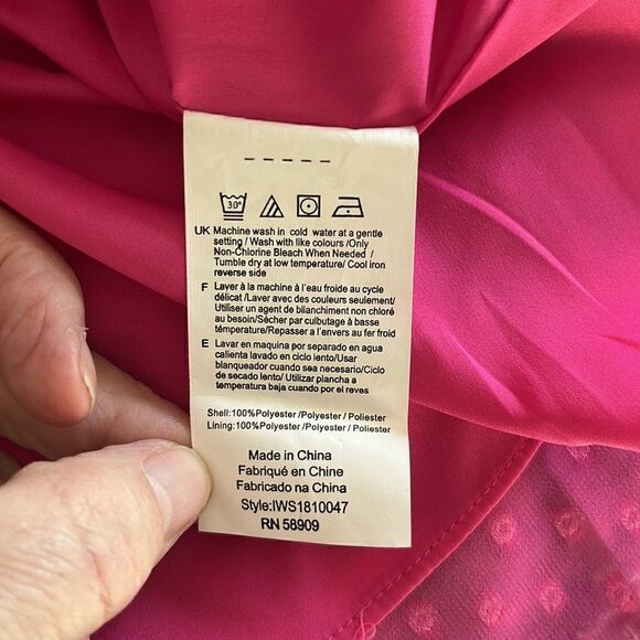 2/20. 
IMNYC Isaac Mizrahi Pink Lined with Sheer Pink Swiss Polka Blouse - Picture 8 of 10